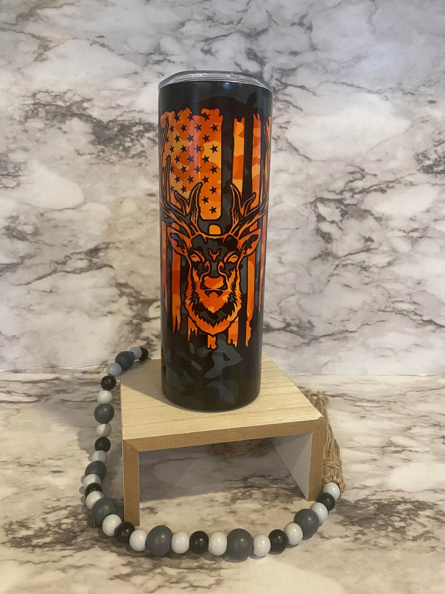 Orange buck with rifles and flag - Skinny Tumbler