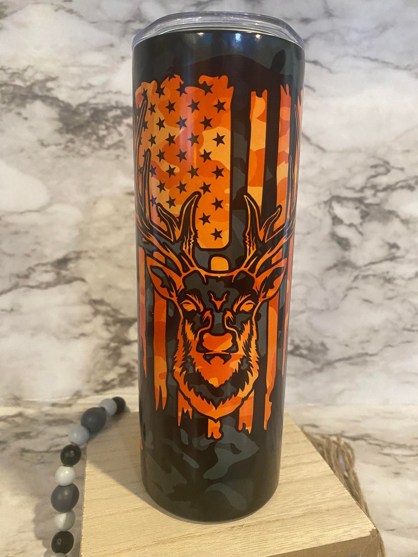 Orange buck with rifles and flag - Skinny Tumbler