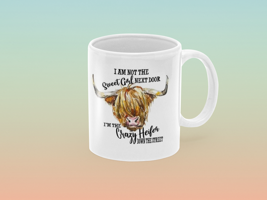 I am not the sweet girl next door I'm the crazy heifer down the street - Coffee Mug